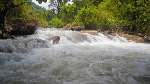 The river flows through the forest. Nangrong Waterfall Thailand. 4K Vidéo 94761262