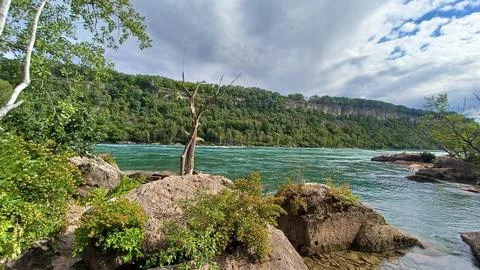 River flows through the landscape of Niagara Falls Stock Photos