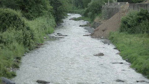 The river flows through the middle of the forest Stock Footage 90485649