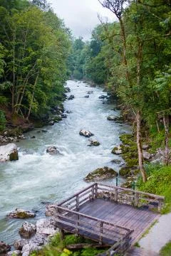 The river flows through a mountainous area in a forest in the Austrian Alps Stock Photos