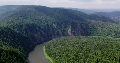 The river flows through mountains and forests Stock Footage 171041681