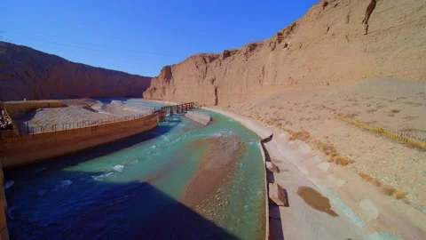 The river flows through the river in the valley Stock Footage 157044875