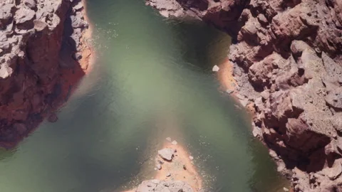 River flows through rocky canyon in a natural setting Stock Footage 344287392