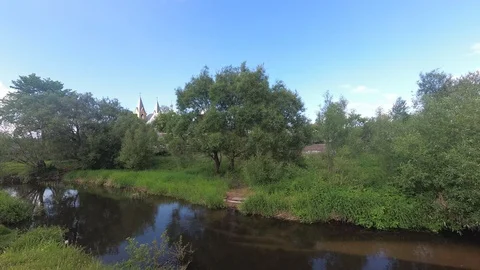 The river flows through the valley to the forest. Time lapse Stock Footage 115491070