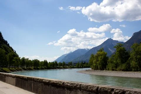 A river flows through a valley Stock Photos