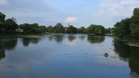 River flows thru small town rural setting Stock Footage 8777748