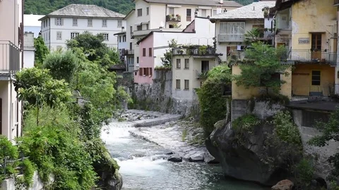 The river flows into the town Video stock 79725320