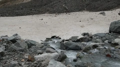 The river flows under the glacier Stock Footage 278995928