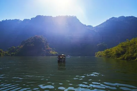 A river flows under a Karst mountain scenery Fotos de archivo