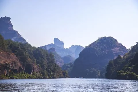 A river flows under a Karst mountain scenery Fotos de archivo
