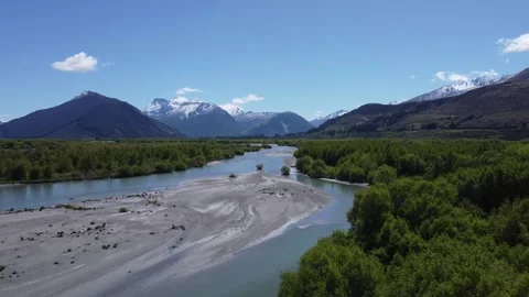 River Fly Over Towards Snow Capped Mountains 4K 스톡 동영상 257393261