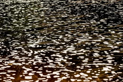 River foam pattern on dark brownish waters of Ibitipoca Stock Photos