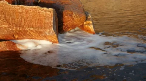 River Foam Under Rocks. Video stock 44528269