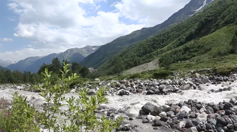 River at the foot of the mountain Stock Footage 68691476