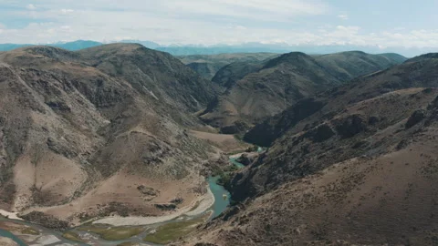The river at the foot of the mountains Stock Footage 250309218