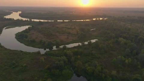 River forest sunset dawn sun jungle nature lake water tree Stock Footage 253571065