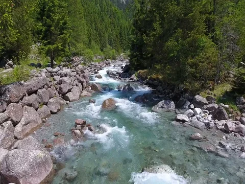 River in a forest - Turquoise water in mountain Video stock 77651587