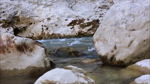 The river framed by the rocks in slow motion Stock-Footage 78633457