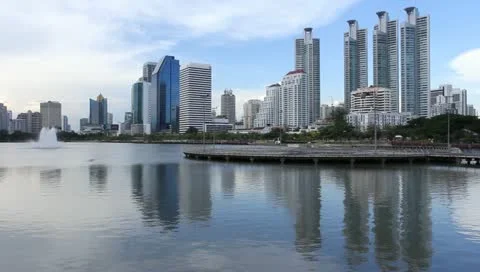 River in front of modern city Stock Footage