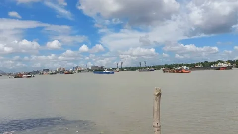 The river ganges, cloud sky and second hooghly  bridge Stock Footage 201010087