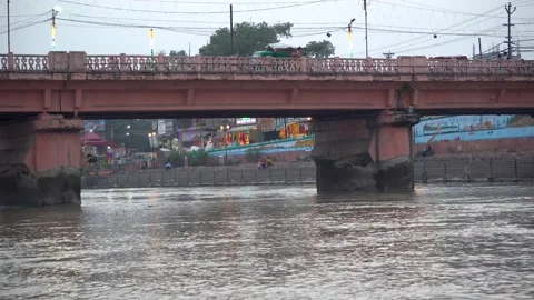 River Ganges flowing under the old constructed bridge 動画素材 217399513