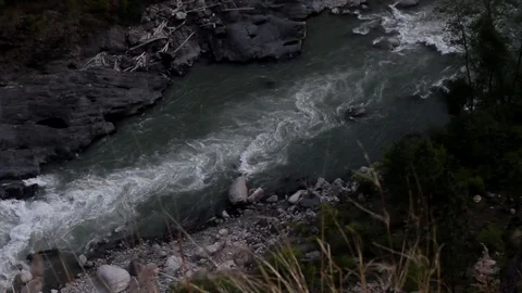 River Ganges flows in a deep gorge amidst thick forests 스톡 동영상 102518007