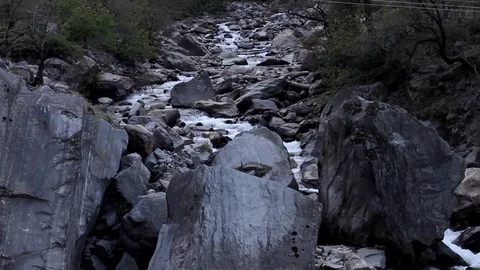 River Ganges flows through Himalayan rocks boulders 스톡 동영상 102519415