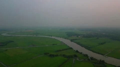 River of Gold A Breathtaking 4K Drone Sunset over a Majestic Landscape and R Stock Footage 241507883
