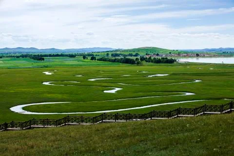 The river on the grassland Stock Photos