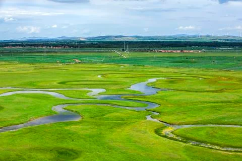 The river on the grassland Stock Photos