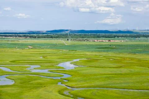 The river on the grassland Stock Photos