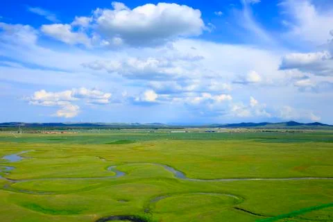 The river on the grassland Stock Photos