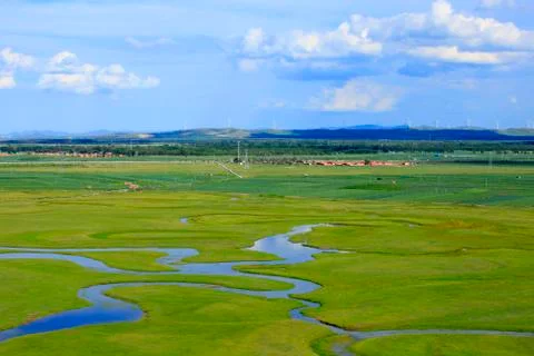 The river on the grassland Stock Photos