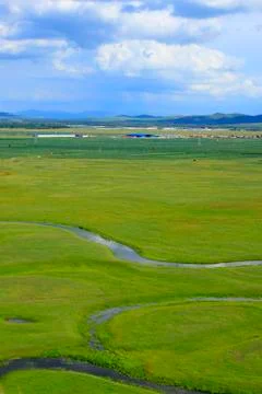 The river on the grassland Stock Photos