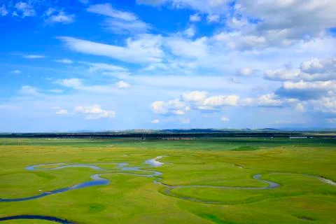 The river on the grassland Stock Photos