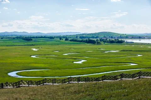 The river on the grassland Stock Photos