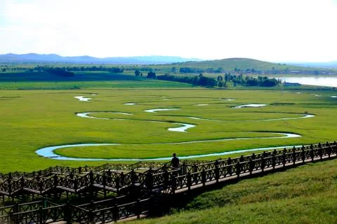 The river on the grassland Stock Photos