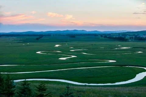 The river on the grassland Stock Photos