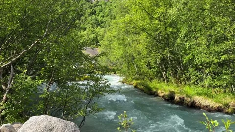 River from grecier briksdalsbreen Stock Footage 337364562