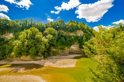 River on the green hills Stock Photos