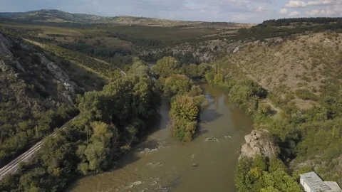 River in a green valley Stock-Footage 129290409