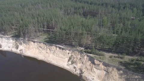 River with a high precipice and the forest on the shore Stock Footage 101517749