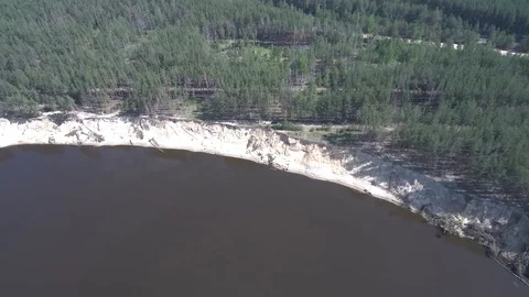 River with a high precipice and the forest on the shore Stock Footage 101517794