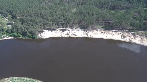 River with a high precipice and the forest on the shore Stock Footage 101517843