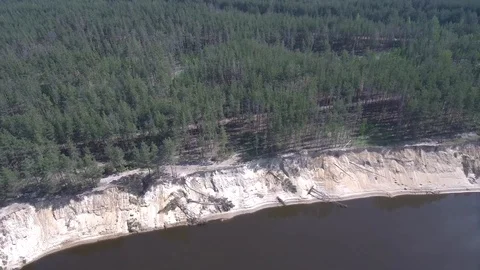 River with a high precipice and the forest on the shore Stock Footage 101517969