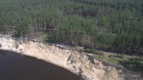 River with a high precipice and the forest on the shore Stock Footage 101518006
