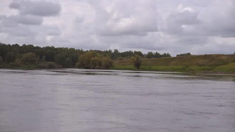 River hill gray clouds autumn Stock Footage 168008596