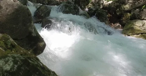 River Hubelj, Ajdovščina. Water stream with foam. Stock-Footage 75743853