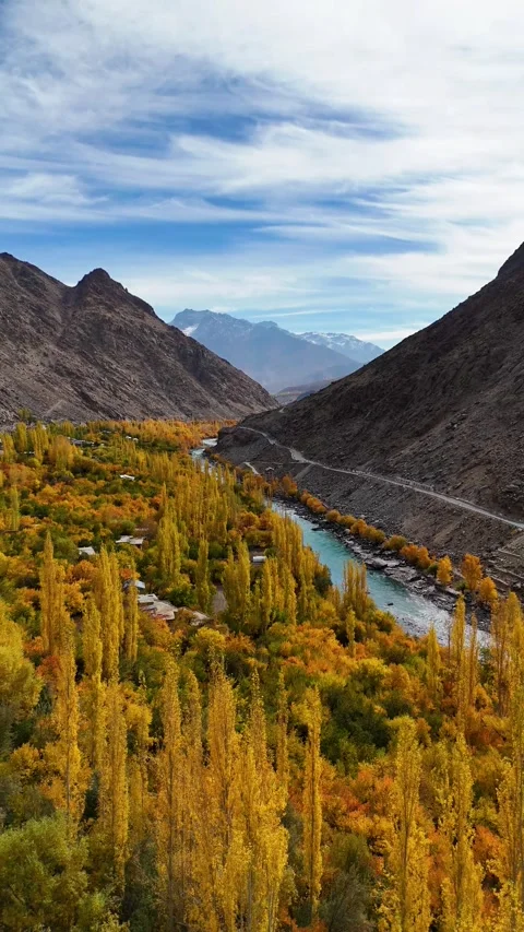 River hugging the mountains – Kargil in fall from vertical drone view. Stock Footage 310664710