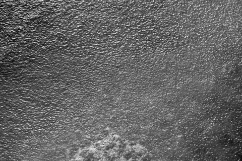 River ice texture background close up. Black and white Stock Photos